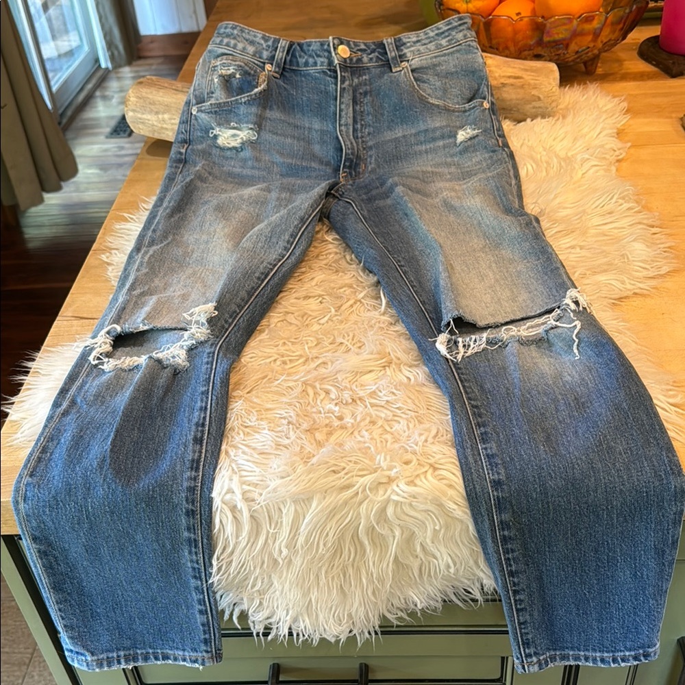 Rollers mid-high rise slim jeans